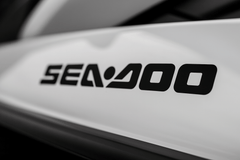 Close-up of a Sea-Doo logo on a metallic surface