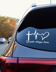 A white vinyl decal sticker with a cross and the text 'FAITH HOPE LOVE JESUS CHRIST' designed for car or truck windows.