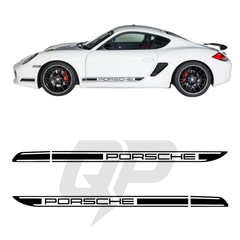White Porsche car with black Porsche logo decal on a white background