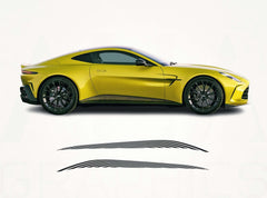Yellow sports car with black graphics on a white background