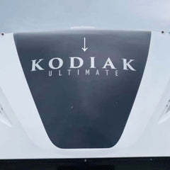 Kodiak Ultimate decal on a vehicle roof with a clear sky background