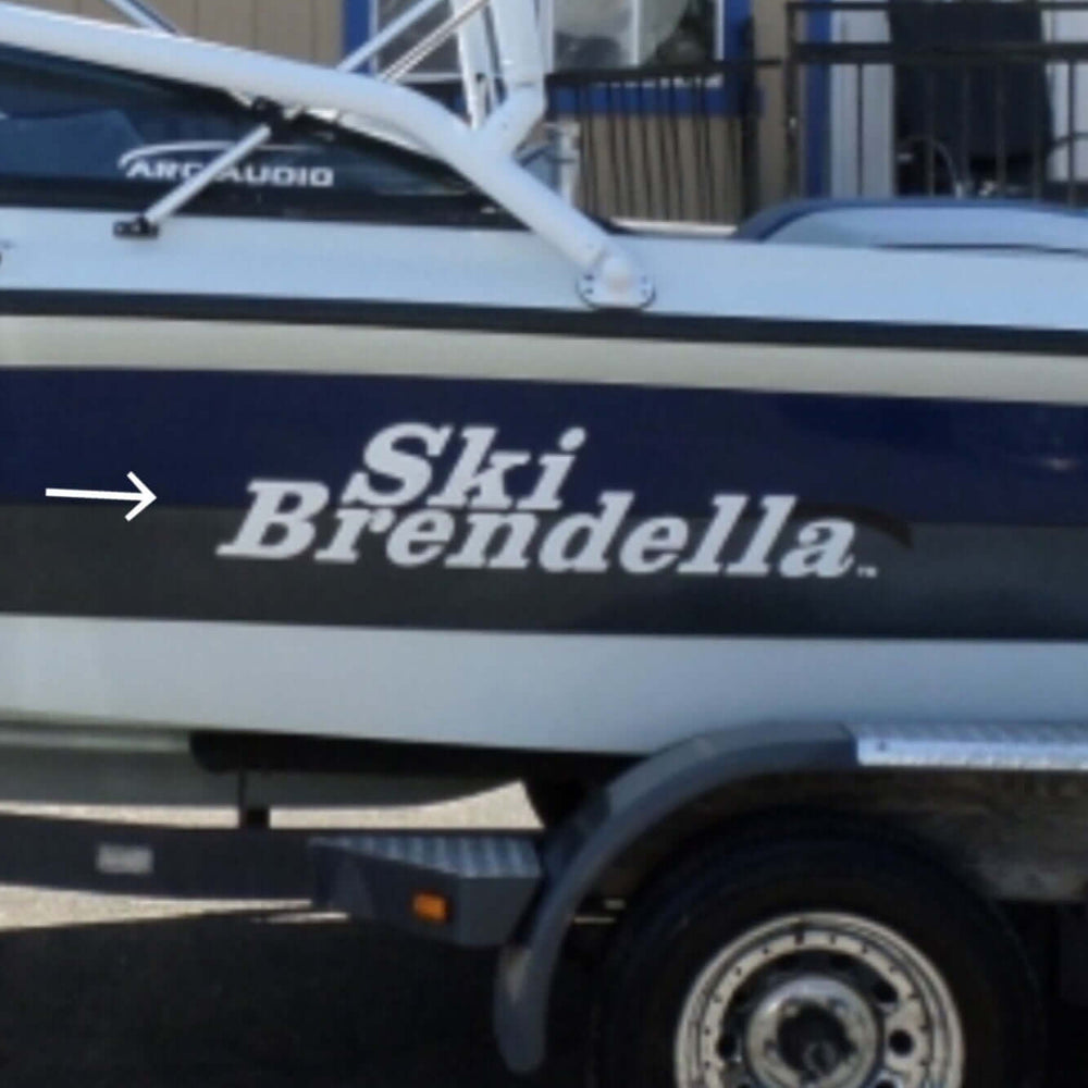 Boat with 'Ski Brendella' branding on a trailer